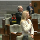 Missouri state Sen. Jamilah Nasheed (background, center) is seen sitting down as other senators recite the Pledge of Allegiance on Sept. 14, 2016.
Fox2 Screenshot